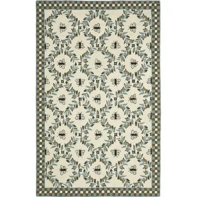 August Grove Kinchen Ivory/Blue Area Rug; Rectangle 6 x 9